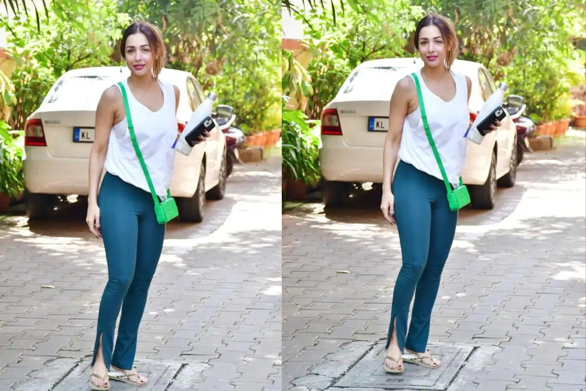 Malaika Arora Looks Uber Cool In Yoga Pants, Crop Top; Netizen Asks 'How  Come You Are Covered Today' - News18